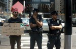 Protest sign makes cop think twice