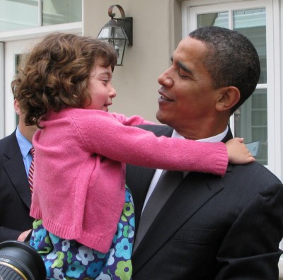 President Obama with little girl, photo by Jurvetson, Flickr.com