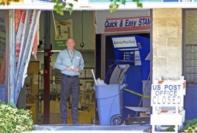 Photo: Jim Damaske, Tampa Bay Times. post office ramming