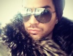 Adam Lambert Likes the Feel of Dead Animal Around His Neck