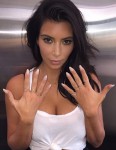 Kim Kardashian Hires Tutor to Help Keep Track of Brood Total
