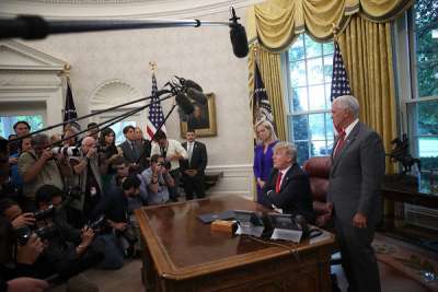 The Trumpsters: Donald Trump, Mike Pence and Kirstjen Nielsen.