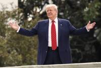 Psycho with Face Painted Orange Rants and Raves on White House Roof